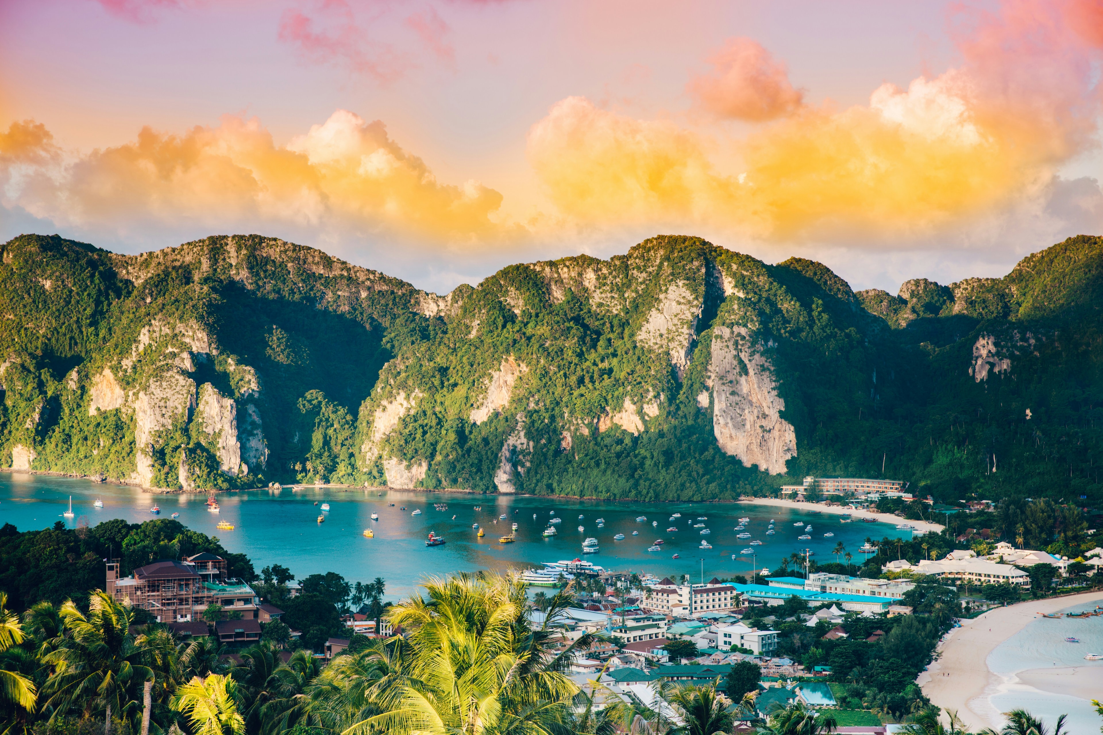Thailand bay with cliffs and sunset clouds